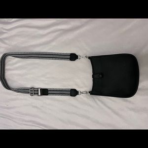 Crossbody black purse.